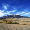 Elk Mountain, Wispy Clouds And Berm Like in Snow Pix