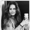 Young Model Sitting and Holding Pepsi Can