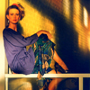 Female Model Lit by Filtered Sunlight through Stained Glass Windows