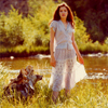 Female Model in Light Summer Dress Next to River