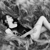 Female in Swimsuit, Lying In Silky Grass