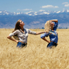Two Female Models Posing in Wheat Field
