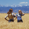 Two Female Models Posing in Wheat Field