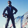 Male Model Standing on the Wing, Holding his Helmet