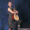 Bethany Zill Posing with (and Hugging) Her Guitar